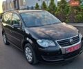 Чорний Фольксваген Туран, об'ємом двигуна 1.6 л та пробігом 261 тис. км за 8200 $, фото 1 на Automoto.ua