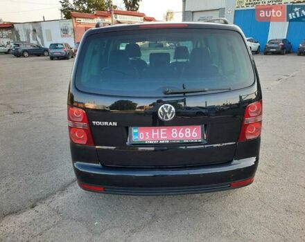 Черный Фольксваген Туран, объемом двигателя 1.6 л и пробегом 213 тыс. км за 8550 $, фото 15 на Automoto.ua