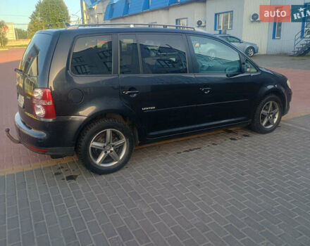 Черный Фольксваген Туран, объемом двигателя 2 л и пробегом 290 тыс. км за 6500 $, фото 2 на Automoto.ua