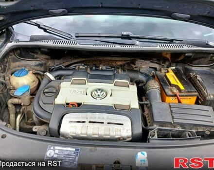 Черный Фольксваген Туран, объемом двигателя 1.4 л и пробегом 240 тыс. км за 6500 $, фото 1 на Automoto.ua