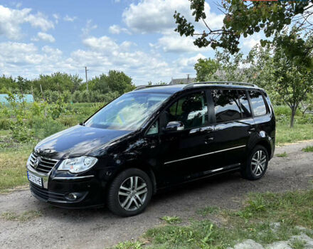 Черный Фольксваген Туран, объемом двигателя 1.39 л и пробегом 191 тыс. км за 8500 $, фото 24 на Automoto.ua