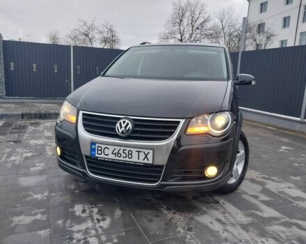 Черный Фольксваген Туран, объемом двигателя 2 л и пробегом 242 тыс. км за 6950 $, фото 2 на Automoto.ua