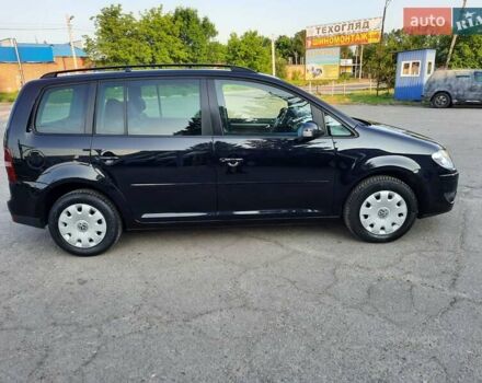 Черный Фольксваген Туран, объемом двигателя 1.6 л и пробегом 213 тыс. км за 8550 $, фото 23 на Automoto.ua