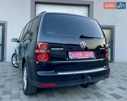 Чорний Фольксваген Туран, об'ємом двигуна 2 л та пробігом 292 тис. км за 8999 $, фото 28 на Automoto.ua