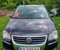Черный Фольксваген Туран, объемом двигателя 1.4 л и пробегом 240 тыс. км за 6500 $, фото 1 на Automoto.ua