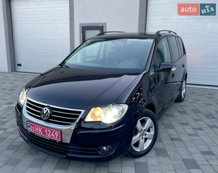 Чорний Фольксваген Туран, об'ємом двигуна 2 л та пробігом 292 тис. км за 8999 $, фото 24 на Automoto.ua