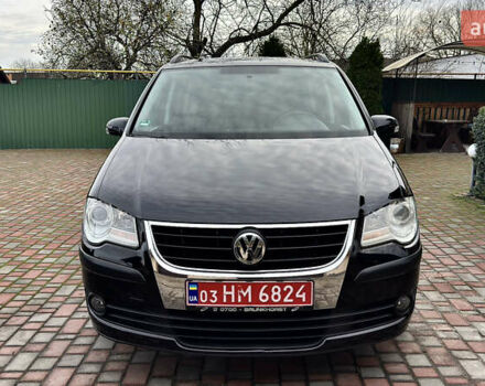 Черный Фольксваген Туран, объемом двигателя 1.6 л и пробегом 176 тыс. км за 8198 $, фото 1 на Automoto.ua