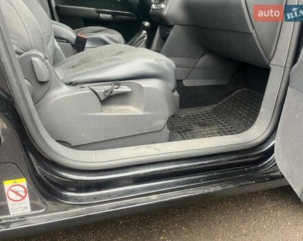 Черный Фольксваген Туран, объемом двигателя 2 л и пробегом 208 тыс. км за 7771 $, фото 24 на Automoto.ua