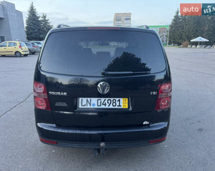 Черный Фольксваген Туран, объемом двигателя 1.4 л и пробегом 224 тыс. км за 6499 $, фото 4 на Automoto.ua