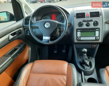 Черный Фольксваген Туран, объемом двигателя 1.6 л и пробегом 213 тыс. км за 8550 $, фото 70 на Automoto.ua