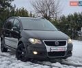 Черный Фольксваген Туран, объемом двигателя 1.4 л и пробегом 230 тыс. км за 7499 $, фото 1 на Automoto.ua