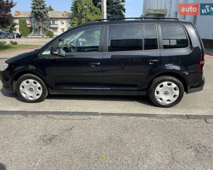 Чорний Фольксваген Туран, об'ємом двигуна 1.4 л та пробігом 192 тис. км за 7500 $, фото 4 на Automoto.ua