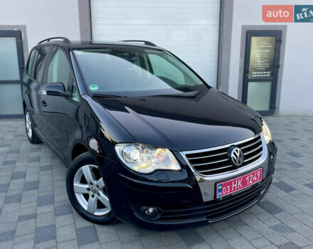 Чорний Фольксваген Туран, об'ємом двигуна 2 л та пробігом 292 тис. км за 8999 $, фото 6 на Automoto.ua