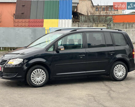 Черный Фольксваген Туран, объемом двигателя 1.6 л и пробегом 193 тыс. км за 7799 $, фото 6 на Automoto.ua