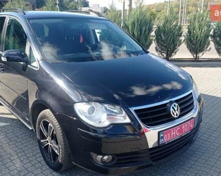 Чорний Фольксваген Туран, об'ємом двигуна 1.4 л та пробігом 216 тис. км за 7800 $, фото 41 на Automoto.ua