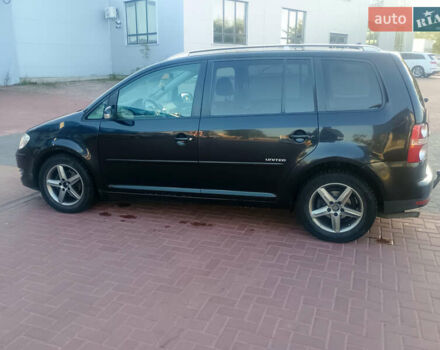 Черный Фольксваген Туран, объемом двигателя 2 л и пробегом 290 тыс. км за 6500 $, фото 13 на Automoto.ua