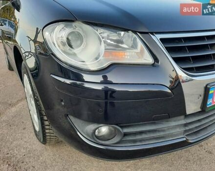 Черный Фольксваген Туран, объемом двигателя 1.6 л и пробегом 213 тыс. км за 8550 $, фото 27 на Automoto.ua