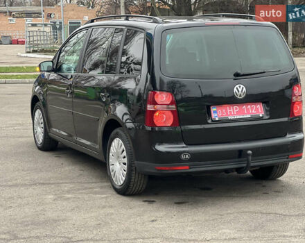 Черный Фольксваген Туран, объемом двигателя 1.6 л и пробегом 193 тыс. км за 7799 $, фото 23 на Automoto.ua