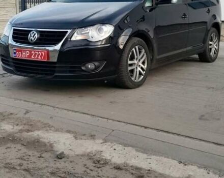 Чорний Фольксваген Туран, об'ємом двигуна 1.4 л та пробігом 212 тис. км за 6200 $, фото 1 на Automoto.ua