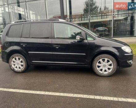 Черный Фольксваген Туран, объемом двигателя 2 л и пробегом 208 тыс. км за 7771 $, фото 3 на Automoto.ua