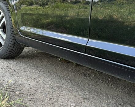 Черный Фольксваген Туран, объемом двигателя 1.4 л и пробегом 191 тыс. км за 8500 $, фото 7 на Automoto.ua