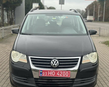 Чорний Фольксваген Туран, об'ємом двигуна 1.6 л та пробігом 260 тис. км за 6299 $, фото 1 на Automoto.ua