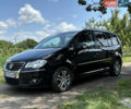 Черный Фольксваген Туран, объемом двигателя 1.39 л и пробегом 191 тыс. км за 8500 $, фото 1 на Automoto.ua