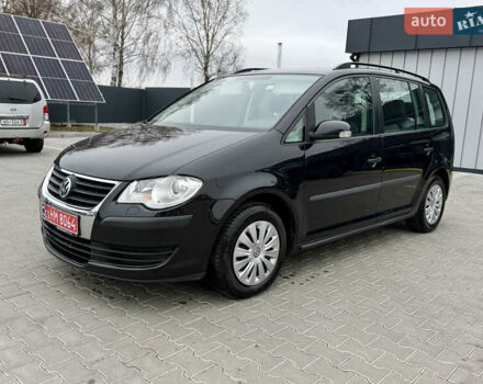 Черный Фольксваген Туран, объемом двигателя 1.4 л и пробегом 227 тыс. км за 7200 $, фото 6 на Automoto.ua