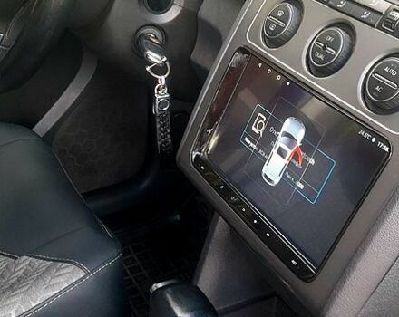 Черный Фольксваген Туран, объемом двигателя 1.4 л и пробегом 242 тыс. км за 7500 $, фото 5 на Automoto.ua