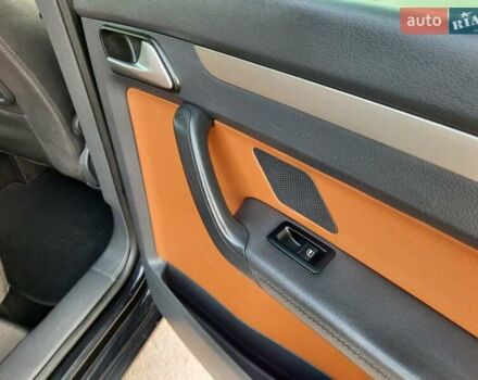 Черный Фольксваген Туран, объемом двигателя 1.6 л и пробегом 213 тыс. км за 8550 $, фото 129 на Automoto.ua