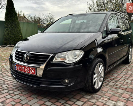 Черный Фольксваген Туран, объемом двигателя 1.6 л и пробегом 176 тыс. км за 8198 $, фото 2 на Automoto.ua