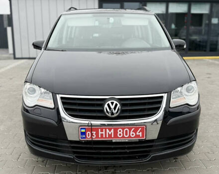 Черный Фольксваген Туран, объемом двигателя 1.4 л и пробегом 227 тыс. км за 7200 $, фото 3 на Automoto.ua