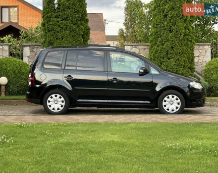 Черный Фольксваген Туран, объемом двигателя 1.6 л и пробегом 220 тыс. км за 7700 $, фото 4 на Automoto.ua