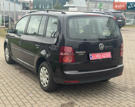 Чорний Фольксваген Туран, об'ємом двигуна 1.6 л та пробігом 260 тис. км за 6299 $, фото 5 на Automoto.ua