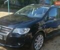 Черный Фольксваген Туран, объемом двигателя 1.39 л и пробегом 175 тыс. км за 9000 $, фото 1 на Automoto.ua