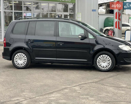 Черный Фольксваген Туран, объемом двигателя 1.6 л и пробегом 193 тыс. км за 7799 $, фото 13 на Automoto.ua