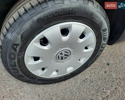 Черный Фольксваген Туран, объемом двигателя 1.6 л и пробегом 213 тыс. км за 8550 $, фото 126 на Automoto.ua