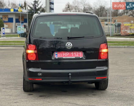 Черный Фольксваген Туран, объемом двигателя 1.6 л и пробегом 193 тыс. км за 7799 $, фото 25 на Automoto.ua