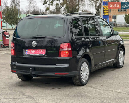 Черный Фольксваген Туран, объемом двигателя 1.6 л и пробегом 193 тыс. км за 7799 $, фото 18 на Automoto.ua
