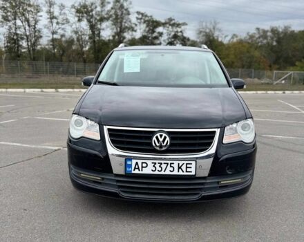 Черный Фольксваген Туран, объемом двигателя 1.4 л и пробегом 211 тыс. км за 7100 $, фото 1 на Automoto.ua