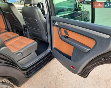 Черный Фольксваген Туран, объемом двигателя 1.6 л и пробегом 213 тыс. км за 8550 $, фото 128 на Automoto.ua