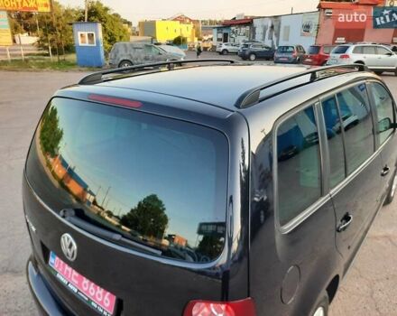 Черный Фольксваген Туран, объемом двигателя 1.6 л и пробегом 213 тыс. км за 8550 $, фото 115 на Automoto.ua