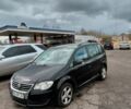Черный Фольксваген Туран, объемом двигателя 1.9 л и пробегом 380 тыс. км за 3500 $, фото 1 на Automoto.ua