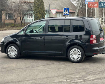Черный Фольксваген Туран, объемом двигателя 1.6 л и пробегом 193 тыс. км за 7799 $, фото 8 на Automoto.ua
