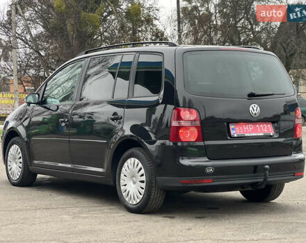 Черный Фольксваген Туран, объемом двигателя 1.6 л и пробегом 193 тыс. км за 7799 $, фото 22 на Automoto.ua