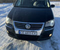 Черный Фольксваген Туран, объемом двигателя 1.9 л и пробегом 350 тыс. км за 6600 $, фото 1 на Automoto.ua