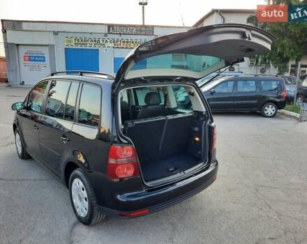 Черный Фольксваген Туран, объемом двигателя 1.6 л и пробегом 213 тыс. км за 8550 $, фото 117 на Automoto.ua