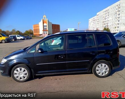 Черный Фольксваген Туран, объемом двигателя 1.4 л и пробегом 291 тыс. км за 6050 $, фото 1 на Automoto.ua