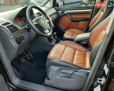 Черный Фольксваген Туран, объемом двигателя 1.6 л и пробегом 213 тыс. км за 8550 $, фото 50 на Automoto.ua