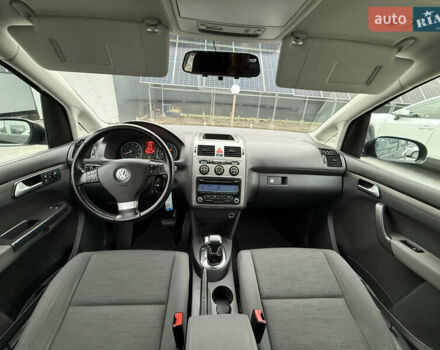 Черный Фольксваген Туран, объемом двигателя 1.4 л и пробегом 227 тыс. км за 7200 $, фото 1 на Automoto.ua